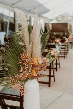 an outdoor dining area with tables and chairs