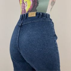 Vintage From 1970’s, Dark Wash Navy High Waisted Mom Jeans By Lee. In Great Worn Condition. Hem Has Been Altered. Elastic Waistband. Pocketless Backside For Sculpted Look. Logo Patch. Union Made, Has Workers Union Tag. Made In Usa. Sz 12 Waist: 14.5” Rise: 13.5” Inseam: 28” 2375 Workers Union, High Waisted Mom Jeans, Union Made, Lee Jeans, High Jeans, Colored Jeans, Patch Logo, Mom Jeans, Made In Usa