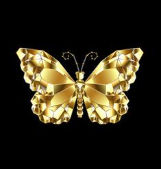 a golden butterfly on a black background