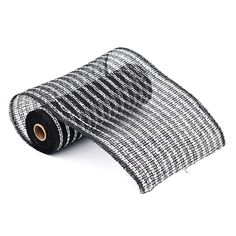 a roll of black and white checkered fabric