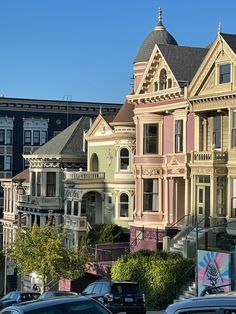 a row of multi - colored houses in san francisco, california