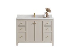 a bathroom vanity with marble top and drawers