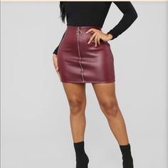 Pu Leather Mini Skirt Zipper 16" Length 95% Polyester 5% Spandex Slightly Stretchy Fall Club Skirt With Zipper Closure, Fall Mini Skirt With Zipper For Night Out, Chic Red Mini Skirt For Club, Chic Burgundy Skirt For Night Out, Red Mini Skirt For Fall Night Out, Red Mini Skirt For Night Out In Fall, Burgundy Mini Skirt For Fall, Burgundy Leather Skirt Outfit, Maroon Skirt Outfit