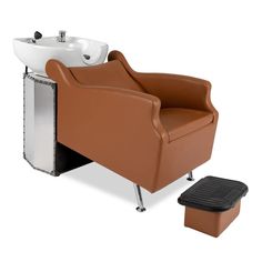 a brown chair sitting next to a white sink