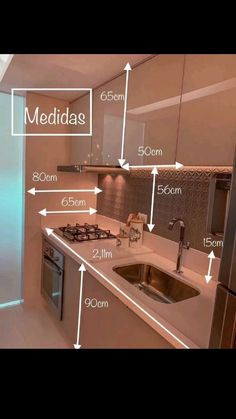 a kitchen with all the measurements in front of it