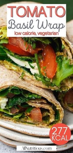 a close up of a wrap with tomatoes and lettuce