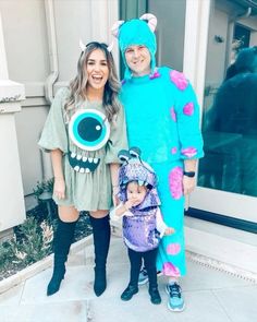 two women and a child dressed up as monsters