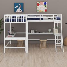 a white bunk bed sitting next to a desk and chair on top of a hard wood floor