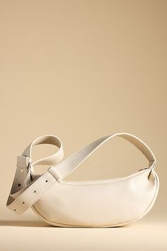 Polyurethane; polyester lining One inner slip pocket One inner zip pocket Zipper styling Imported | Faux-Leather Sling Bag by Anthropologie in Beige, Women's, Polyester/Polyurethane Beige Leather Baguette Bag For On-the-go, Chic Faux Leather Shoulder Bag With Zipper Pocket, Leather Shoulder Belt Bag With Zipper Closure, Leather Shoulder Belt Bag With Zipper, Everyday Leather Belt Bag With Zipper, Chic Belt Bag With Zipper Closure, Chic Shoulder Belt Bag With Zipper Closure, Chic Shoulder Belt Bag With Zipper, Modern Faux Leather Baguette Bag With Zipper