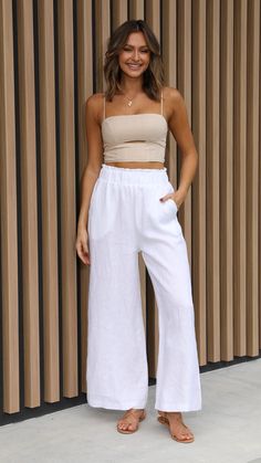 DETAILS - Paper bag style - Elasticised waistband  - Wide leg  - Functional side pockets - 100% Linen MODEL    MEASUREMENTS      Approx garment measurements are in cms     SIZE   WAIST   LENGTH     8/S   64   114     10/M   66   115     12/L   72   116     14/XL   78   118 White Cotton Pants Outfit, Styling Linen Pants, White Linen Pants Outfit, Linen Pants Outfit, White Linen Pants, Polyester Pants, Linen Style, Bag Style, Spring Summer Outfits