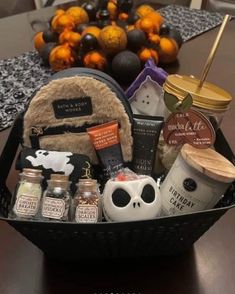 a basket filled with halloween items on top of a table