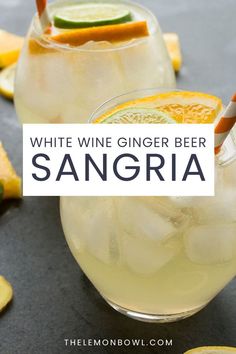 white wine ginger beer sangria with orange slices and lime