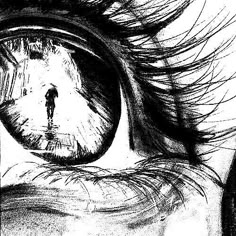 an eye with the reflection of a person standing in front of it and looking into the distance