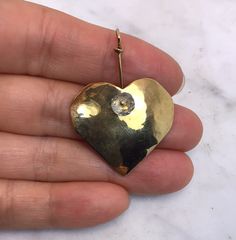 It’s in good condition. It measures 1 5/8” long 1 1/8” wide Marked aw/ 1/02 18K Weights 5.55 grams Thanks for looking! Unique Gold Heart-shaped Jewelry, Unique Heart-shaped Gold Jewelry, Artisan Gold Heart-shaped Jewelry, Handmade 14k Gold Heart Jewelry, Unique Gold Earrings For Valentine's Day, Unique Gold Heart-shaped Earrings, Aquamarine Beads, Fine Jewellery Necklace, Heart Pendant