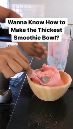 a person pouring something into a bowl with the words wanna know how to make the thickest smoothie bowl?