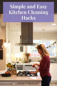 a woman standing in front of a kitchen counter with the words simple and easy kitchen cleaning hack