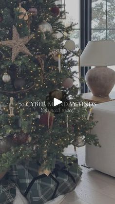 a living room with a christmas tree in the corner