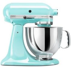 an aqua blue kitchen mixer on a white background