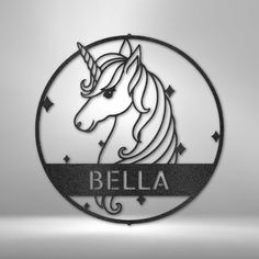 a metal sign that says bela with a unicorn on it