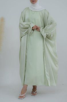 Light green Loves open front maxi satin abaya throw over - ANNAH HARIRI Elegant Green Spring Abaya, Eid Embellished Green Abaya, Light Green Abaya, Fitted Long Sleeve Green Abaya, Green Abaya, Eid Green Maxi-length Abaya, Annah Hariri, Satin Abaya, Modest Activewear