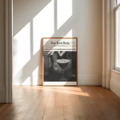 an empty room with a poster on the wall