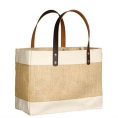 Our Laminated Jute Market Tote with cotton accents and luxurious leather handles is the epitome of style and sustainability. Crafted from eco-friendly jute material and measuring 12.50" W x 9.50" H x 5.50" D, this custom printed tote offers ample space and durability for your everyday needs. Showcase your brand while making an eco-conscious statement with this chic and reusable promotional item. Custom Printed La Jolla Laminated Leather Handle Jute Tote Bag in Natural | Totes | Jute Totes Eco-friendly Canvas Bag With Leather Handles, Burlap Tote Bag With Leather Handles, Rectangular Canvas Bag With Braided Handles, Natural Bags With Canvas Lining For Shopping, Everyday Burlap Bags With Leather Handles, Eco-friendly Canvas Bag For Errands, Daily Burlap Bags With Leather Handles, Daily Use Burlap Bags With Leather Handles, Beige Burlap Shopping Bag