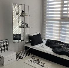 a bedroom with black and white checkered flooring