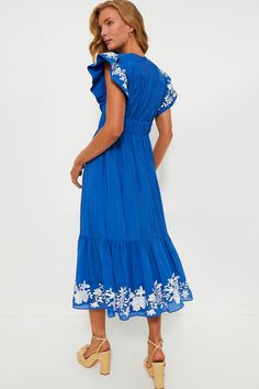 From weekend brunches to weekday dinner dates, there is nothing that this Cerulean Sutton Flutter Sleeve Maxi Dress can't do. The flattering A-line silhouette boasts short flutter sleeves, cinching along the waist, and a wide ruffle hem. The delicate white floral embroidery adds a touch of elegance to the vibrant blue background. Pair with heels and pearl earrings for a look that you will keep coming back to. V-neckline Short flutter sleeves Back zip closure Cinching along waist Side pockets A-l Casual Blue Midi Dress With Flutter Sleeves, Spring Ruched Dress With Cap Sleeves, Spring Cap Sleeve Ruched Dress, Short Sleeve Dress With Gathered Waist For Brunch, Ruched Cap Sleeve Dress For Spring, Blue Casual Dress With Butterfly Sleeves, Casual Blue Dress With Butterfly Sleeves, Blue Flutter Sleeve Midi Dress For The Beach, Blue Midi Dress With Flutter Sleeve For Beach