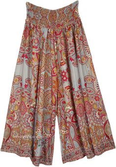 These are in vogue pants for the season, crafted in wide leg style with vertical panel flare. These smocked elastic pants are simple to wear and the shape is great on all body types due to a forgiving cut. #tlb #SplitSkirtsPants #Pocket #Yoga #bohemianfashion #SummerBohoPants Vogue Pants, Boho Whimsical, Elastic Pants, Hippie Look, Wide Leg Palazzo Pants, Trendy Skirts, Split Skirt, Soft Pants, Boho Pants