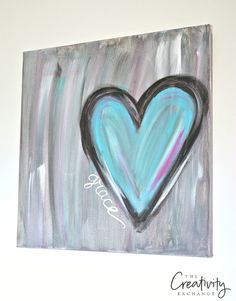 a painting with a blue heart on it