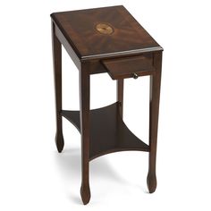 a small wooden table with one drawer open