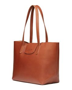 Step out in style with Lyndon's Leather Classic Tote. This Classy and Minimalist Tote is meticulously crafted from premium full-grain leather, boasting a smooth matte and pebbled finish that speaks of timeless elegance. The tote comes with a secure magnet top, an unlined suede interior, a keyholder, and a zip pocket, making it as practical as it is stylish. Timeless Everyday Bag With Leather Backing, Classic Cognac Shoulder Bag In Vegetable Tanned Leather, Classic Everyday Shoulder Bag In Vegetable Tanned Leather, Classic Calf Leather Shoulder Bag For Daily Use, Classic Vegetable Tanned Leather Shoulder Bag For Everyday, Classic Shoulder Bag For Daily Use With Smooth Grain, Classic Everyday Calf Leather Shoulder Bag, Classic Cognac Vegetable Tanned Leather Shoulder Bag, Classic Epsom Leather Shoulder Bag