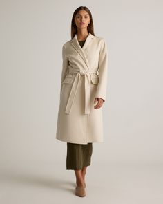 Elevate your winter wardrobe with this 100% Mongolian Cashmere Double-Faced Wrap Coat. Made from Mongolian cashmere known for its crazy-soft feel and toasty warmth, this coat features flap pockets and a notched lapel. A removable tie belt lets you cinch the waist for the perfect fit.  | Quince | Women's 100% Mongolian Cashmere Double-Faced Wrap Coat in Ivory Coast, Size XS Navy And Copper, Wool Wrap Coat, Perfect Coat, Cashmere Wrap, Wrap Coat, Navy And Brown, Ivory Coast, Just Run, Cashmere Coat