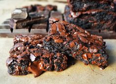 chocolate brownies are stacked on top of each other