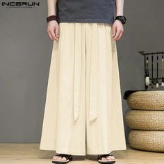 SPECIFICATIONS Brand Name: INCERUN Applicable Season: Four Seasons Origin: Mainland China CN: Guangdong Material: COTTON Applicable Scene: CASUAL Pant Style: Wide leg pants Style: Casual Model Number: Men Solid Color Loose Pants Thickness: midweight Waist Type: MID Decoration: none Gender: MEN Item Type: full length Place Of Origin: China (mainland) Closure Type: Drawstring Fabric Type: Broadcloth Length: Ankle-Length Pants Front Style: Flat Fit Type: LOOSE Color: Black,Beige,Blue Size: S,M,L,XL,2XL,3XL,4XL,5XL,Plus Size Size:S,M,L,XL,2XL,3XL,4XL,5XLFabric Material:100%CottonColor:Black,Beige,BlueSuitable Type:FitStyle:BasicsOccasion:LeisurePattern:Solid colorThickness:ModerationProduct Description:Men's solid color long pants.Label: YesPackage Included:1 * Pants Please note:Thanks to your Men Wide Leg Pants, Mens Trousers Casual, Casual Pants Style, Casual Pant, Drawstring Jogger, Pantalon Large, Loose Pants, Men Vintage, Ankle Length Pants