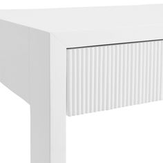 a white table with vertical lines painted on the top and bottom, against a white background