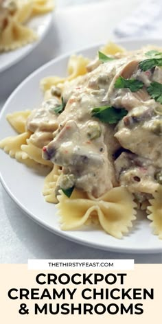 the crockpot creamy chicken and mushrooms is served with pasta on a white plate