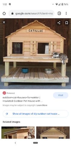 an image of a cat house made out of wood