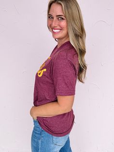 Our Scripted Tigers Tee has a nostalgic nod to the glory days with its scripted lettering and we love it! Perfect for the Dripping Springs mom or dad who’s a pro at balancing coffee in one hand and a team banner in the other. Relive the magic of your own school days while cheering on your favorite Tiger! Classic style for the ultimate game day spirit! Unisex preshrunk tee Lauren is 5'8" and wearing a Medium 50% Cotton, 50% Polyester Machine wash warm & tumble dry low Casual T-shirt With Lettering For Fans, Game Day Team-colored T-shirt With Lettering, Game Day Fan Apparel Top With Lettering, Team-colored T-shirt With Lettering For Game Day, College T-shirt With Team Colors And Lettering, Team Spirit T-shirt With Lettering, Fan Apparel Tops With Lettering For Game Day, Fan Merchandise Relaxed Fit T-shirt With Lettering, Casual Tops With Fan Gear Lettering