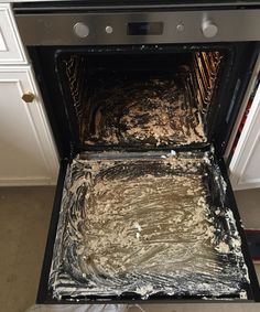 the inside of an oven is covered in tin foil