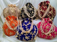 "Lot Of 20 Indian Handmade Women's Embroidered Clutch Purse Potli Bag Pouch Drawstring Bag Wedding Favor Return Gift For Guests Free Ship PRODUCT DETAIL :- -------------------------- Product Item : Embroidered Potli Bags Size : Length- 9\" x 9\" Inches Product Line: Rajasthani Ethnic Women Handbag Potli Bags Material -: Fabrics, Beads Occasion: Any Occasion, Festive, Party, Wedding, Bridal PRODUCT DESCRIPTION :- This colorful Clutch Purse with vibrant colors & ethnically designed is a specia Elegant Multicolor Pouch For Festivals, Festive Multicolor Bag With Floral Embroidery, Multicolor Festive Bag With Floral Embroidery, Festive Multicolor Floral Embroidered Bag, Multicolor Embroidered Potli Bag For Festivals, Embroidered Multicolor Potli Bag For Festivals, Multicolor Dori Work Potli Pouch Bag, Festive Multicolor Embroidered Bags, Festive Multicolor Bag With Intricate Embroidery