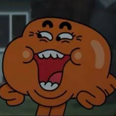 an orange cartoon with its mouth open and eyes wide open in front of a house