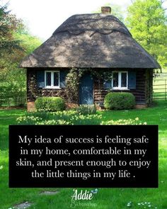 a small house with a thatched roof and green grass in front of it is the words, my idea of success is feeling safe in my home, comfortable in my skin, and present enough to enjoy