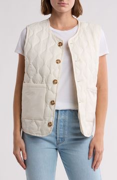 Layer on this quilted taffeta vest featuring roomy patch pockets for enhanced utility. Front button closure Crewneck Front patch pockets Lined, with 100% nylon fill 100% nylon Machine wash, line dry Imported Quilted Casual Vest For Work, Casual Quilted Vest For Work, Nylon Work Vest With Pockets, Spring Nylon Quilted Jacket With Pockets, Fall Cotton Quilted Vest, Everyday Cotton Vest With Button Closure, Fall Quilted Cotton Vest, Cotton Puffer Vest, Casual Quilted Cotton Vest