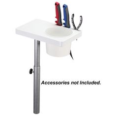 a white table with three knives on it and the words accessories not included above it