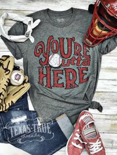 an image of a shirt that says you're here with baseball gloves and mitts