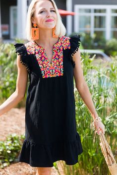 Your Boho look just got better with our Sammy Pom Pom Dress. This lovely black dress features colorful bold embroidery and pom poms on the sleeves. Pair with your fave sandals or a pair of high heels. Pom Dress, Pom Pom Dress, Black Boho, Shift Dress Black, Boho Print, La Fashion, Boho Look, Plus Size Lingerie, Plus Size Swimwear