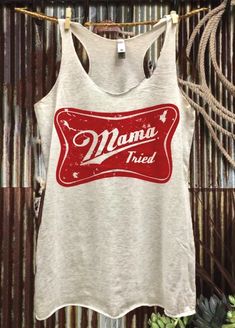 Mama Tried Country Deep racer back tank topCountry Deep tank top Next Level Racer back tri blend tank top, 4.3 oz. 50% Poly 25% Cotton 25% Rayon; fits 1/3 size bigger than normal size for a looser fit Country Tank Tops, Mama Tried, Tank Top Outfits, Plus Size Tank Tops, Summer Style Casual, Crew Neck Shirt, Online Tops, Racer Back, Casual T Shirts