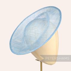 Meet Cindy! Round in shape, this light blue fascinator base has an deep upturn at one edge and an orbital like pleat surrounding the crown. A shape that can be worn in many positions, there are plenty of options when it comes to trimming with all it's nooks and crannies!  Simply add a comb, headband or elastic to secure to the head. Hat base measures: Width: 30cm (11.8 inches) Depth of scoop at deepest point: 6cm (2.3 inches) Over 100 different hat bases are available! To see them all stop by ou Comb Headband, Blue Fascinator, Blank Hats, Millinery Supplies, Hat Base, Different Hats, Fascinator Hat, Millinery Hats, Fascinator Hats