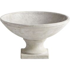 a large white bowl sitting on top of a wooden stand in front of a white background